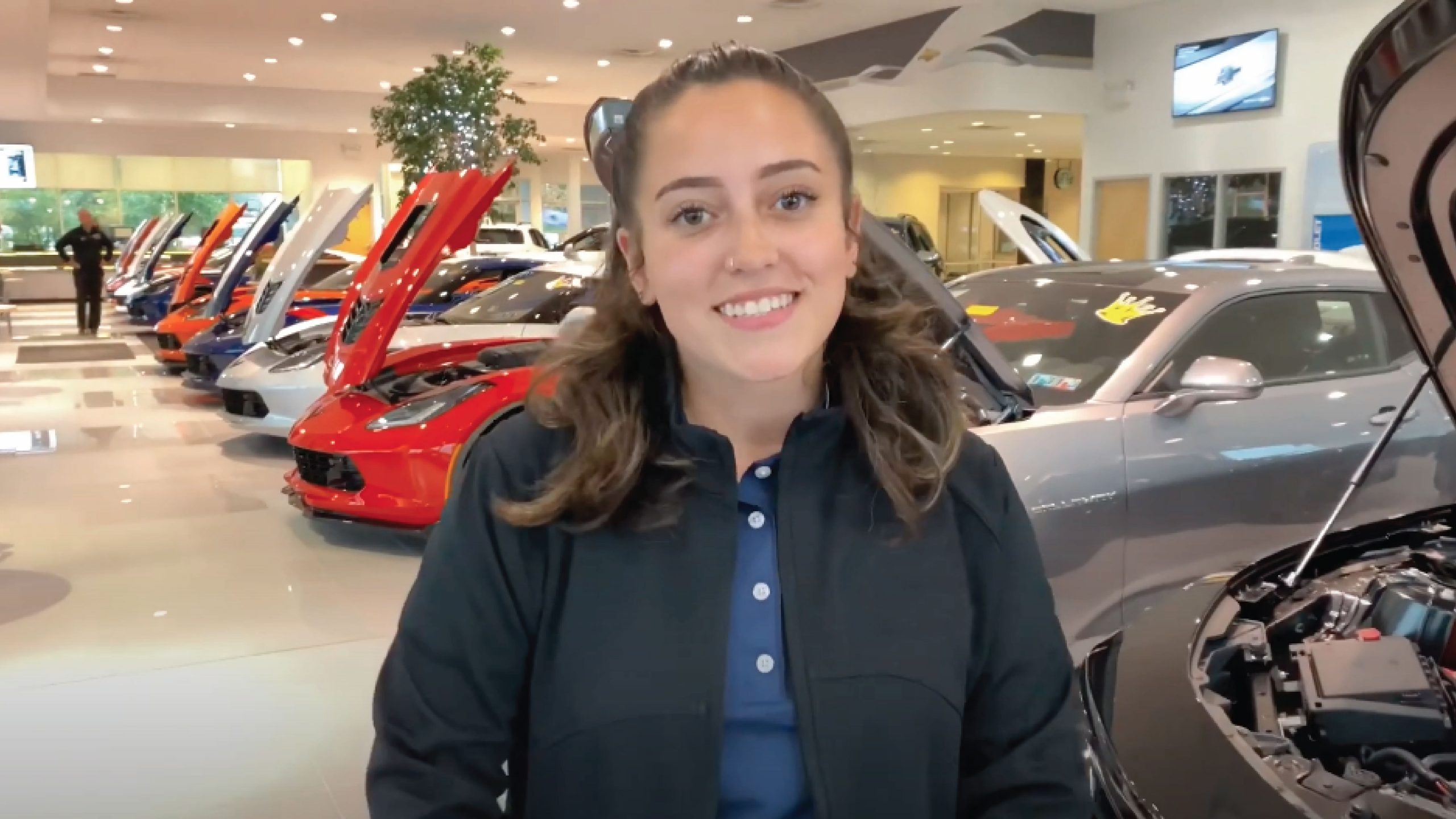 Car Saleswoman learning about Car Sales Training Classes